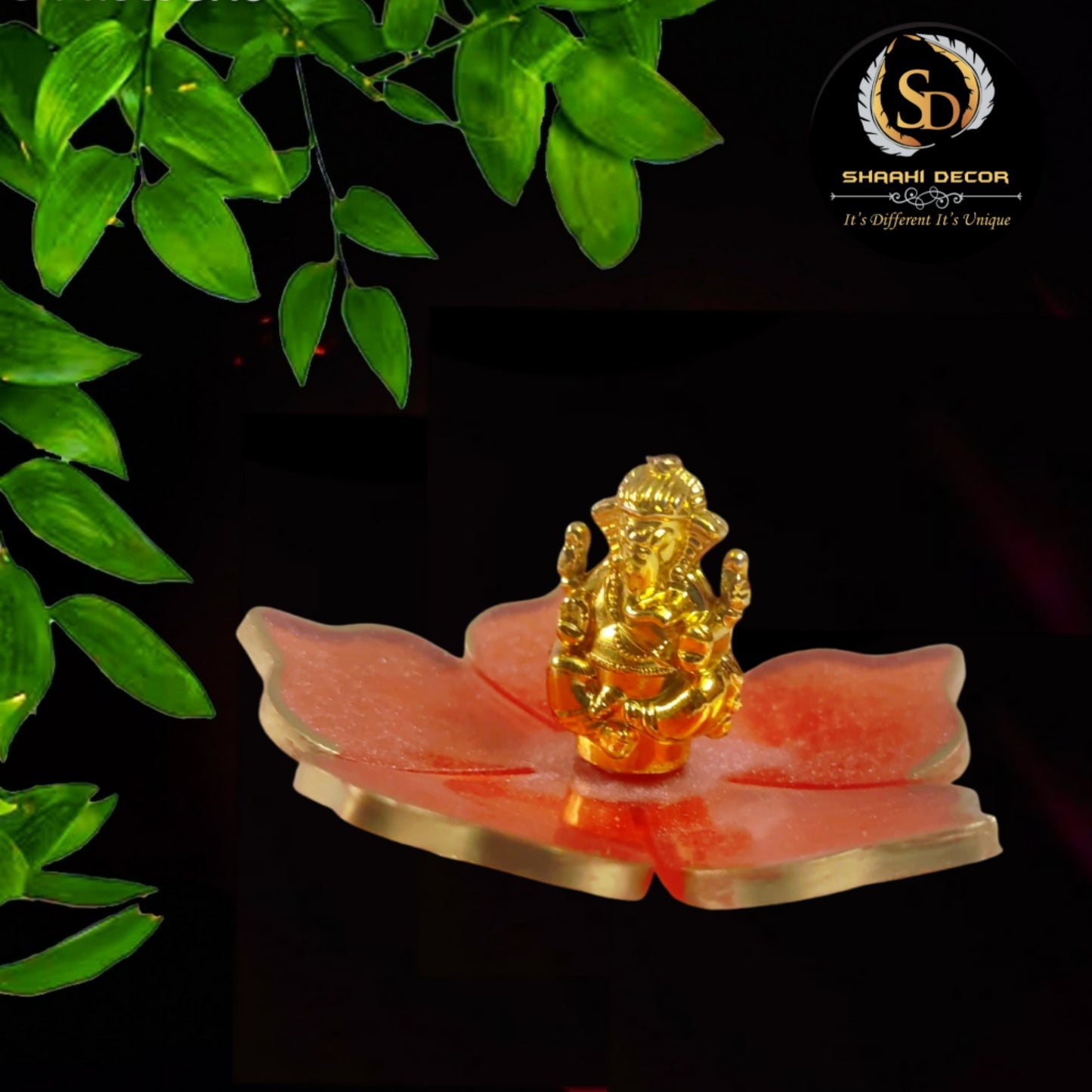 Ganesh Statue In Orange Flower