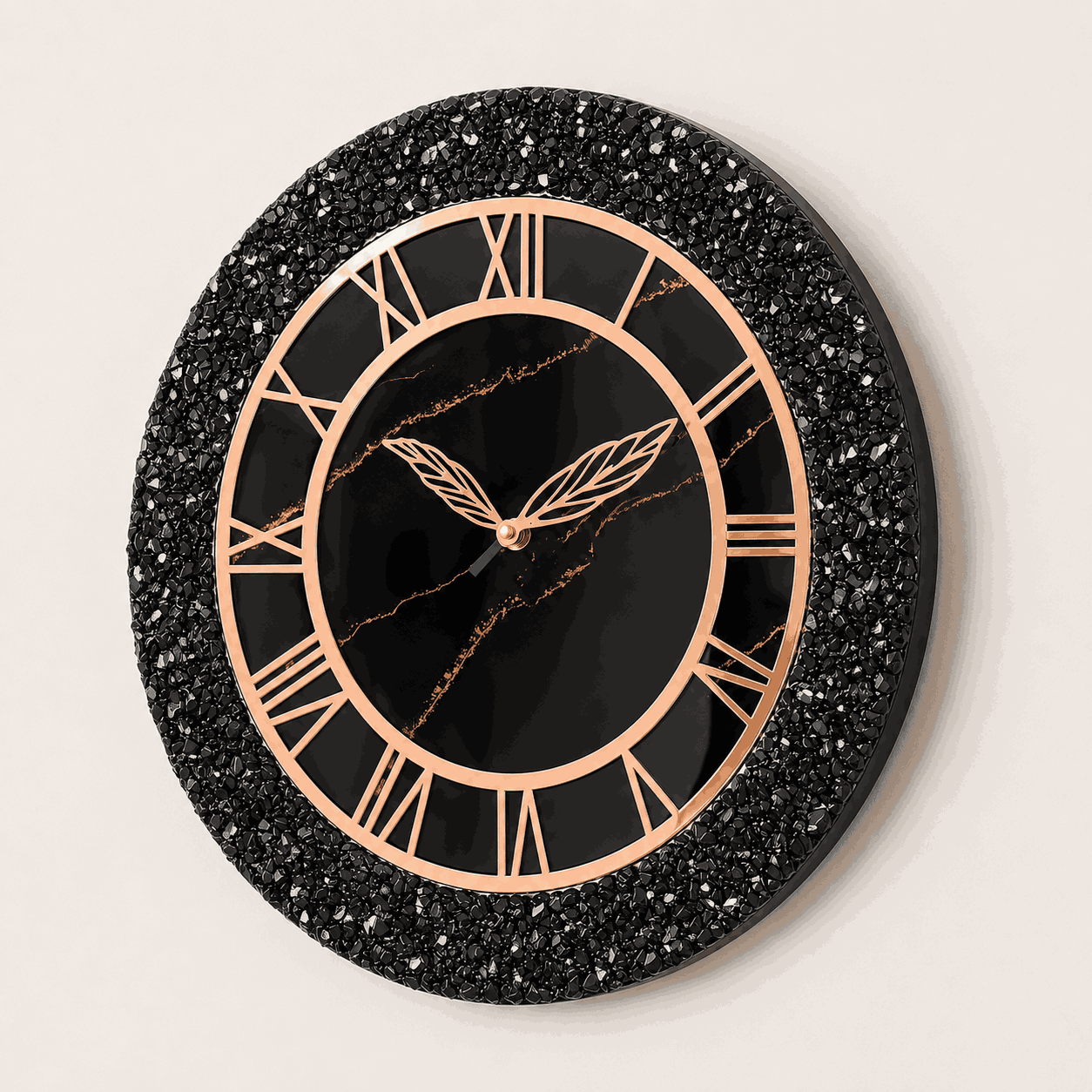 Angled view of black crystal resin wall clock with rose gold detailing