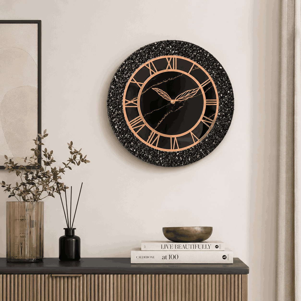 Black crystal resin wall clock displayed on a modern living room wall