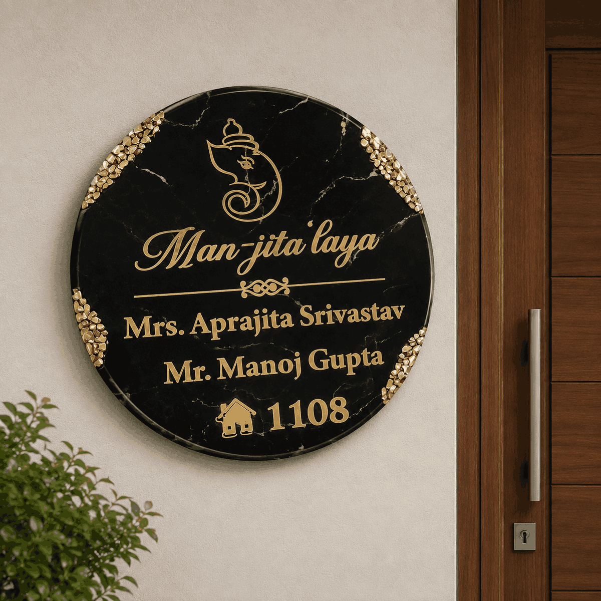 Black Marble Ganesha Resin Name Plate displayed beside a modern home entrance door