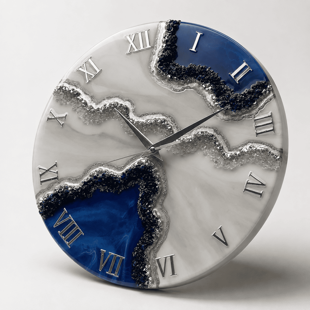 Angled view of blue geode resin wall clock with crystal-style silver detailing