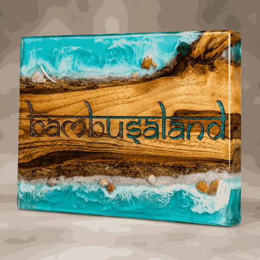 Right angle view of personalized ocean resin name plate showing natural wood and glossy beach design