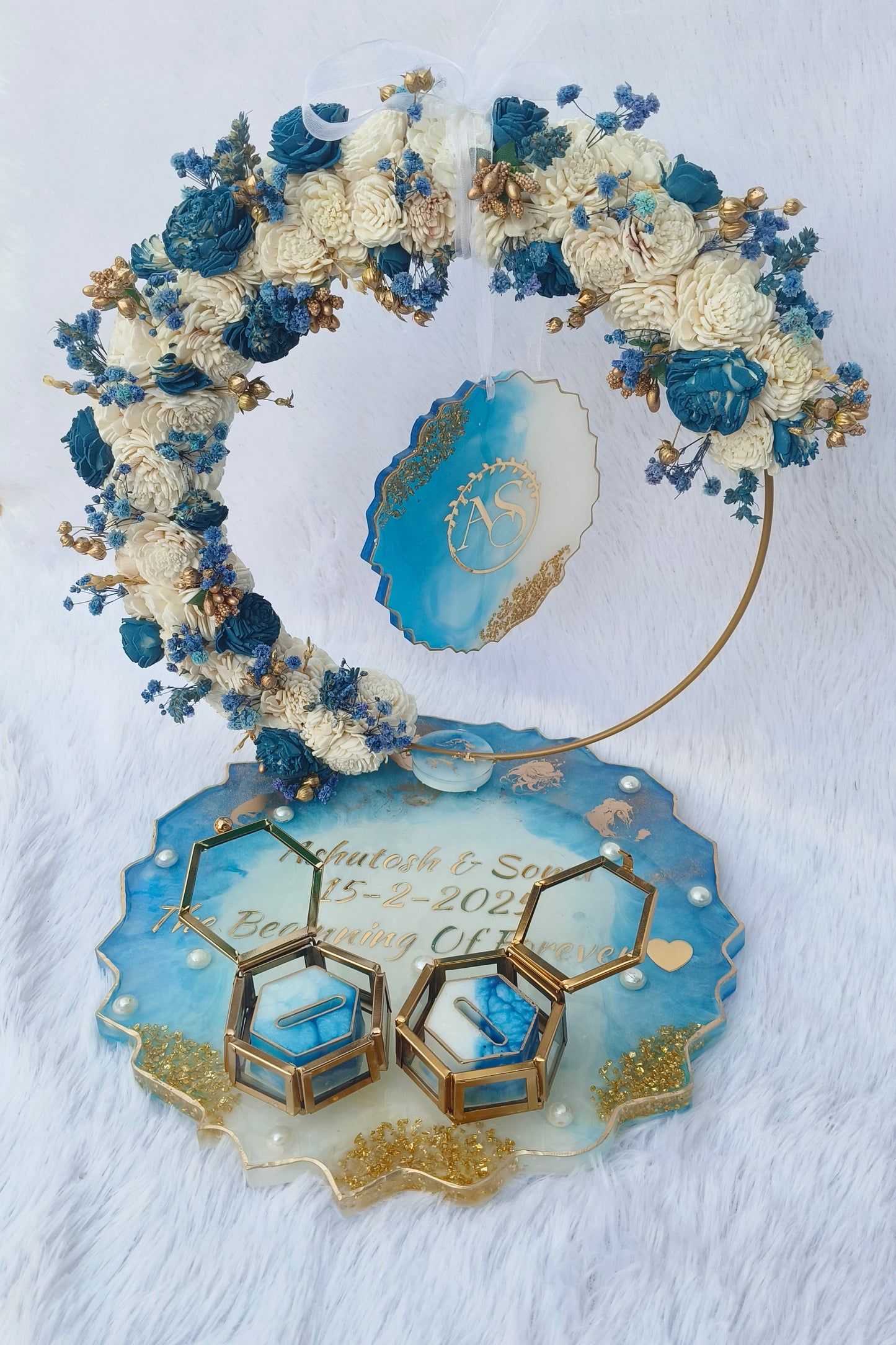 Personalized blue floral resin ring platter with preserved flowers, custom names and date, luxury engagement ring holder for wedding and ring ceremony.