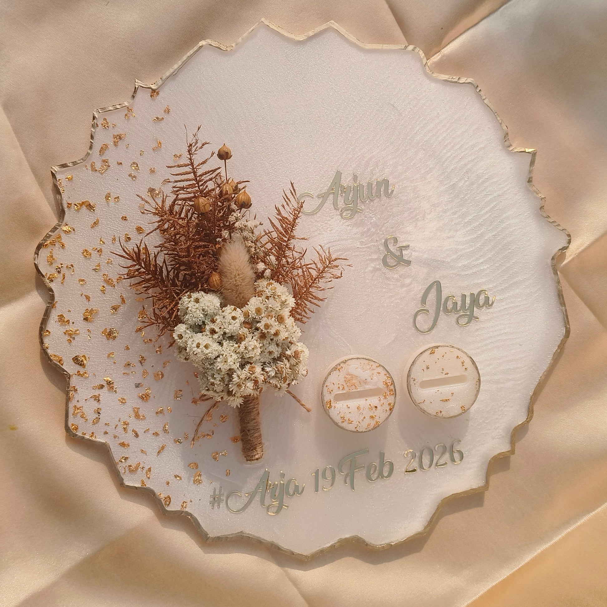 Custom blue floral engagement ring platter made with resin, preserved flowers and personalized couple names for wedding ceremonies.